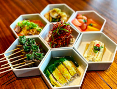 The Bridge Restaurant signature dishes Stuffed Pancake with Tiramisu
Pickled Vegetables
Refined Sichuan Tasting Menu